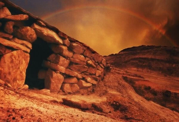 An Empty Tomb With A Rainbow