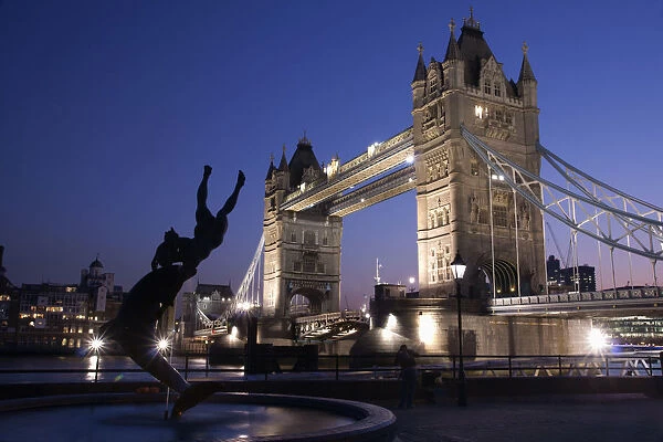 Tower Bridge At Dusk With Dolphin Statue In The Foreground