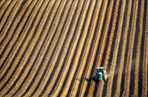 Tractor Plowing A Field