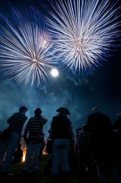 UK, England, East Sussex, People watching fireworks at Nevill Junior Bonfire night; Lewes