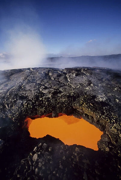 USA, Hawaii, Hawaii Volcanoes National Park; Big Island, East Rift Zone, Opening To Active Lava Tube Showing Orange Glow
