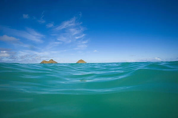 USA, Hawaii, Oahu, Pacific ocean with Mokulua island in background; Lanikai