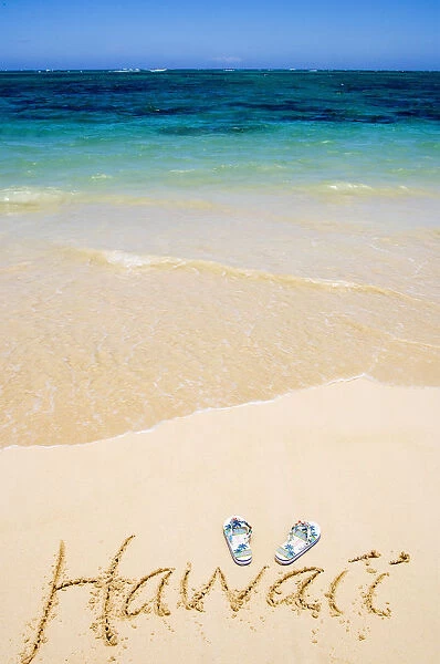 USA, Hawaii, Ocean in background; Kailua, Flipflops and Hawaii written in sand