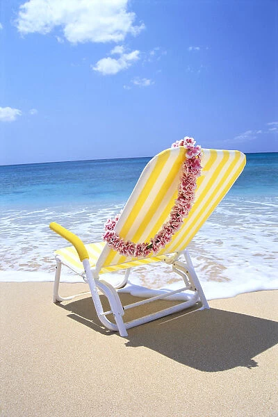 Back View Of Yellow Beach Chair In Sand, Gentle Shore Waters, Pink Lei C1724