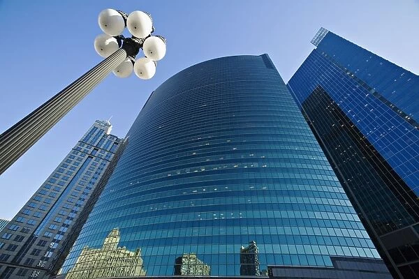 Wacker Drive Building With Street Lamp In Foreground, Low Angle View