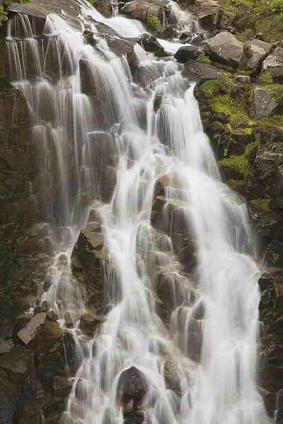 Waterfall Flowing Over Rocks; Washington, Usa