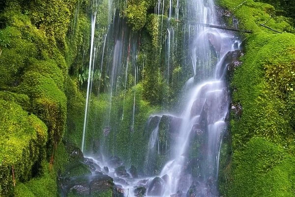 Waterfall Over Moss-Covered Rocks