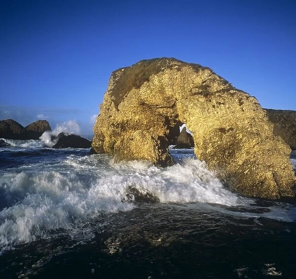 Wave Splashing Against Natural Arch, Antrim Coast, County Antrim, Northern Ireland