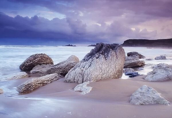 Whitepark Bay, Co Antrim, Ireland; Rocks On The Beach During A Storm