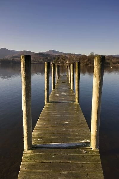 A Wooden Dock Going Into The Lake, Cumbria, England