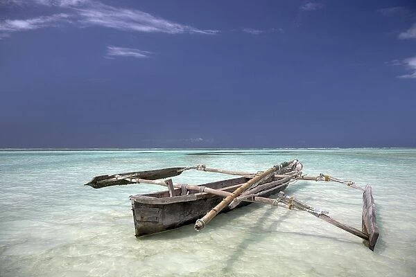 Zanzibar, Africa; Dhow In The Water
