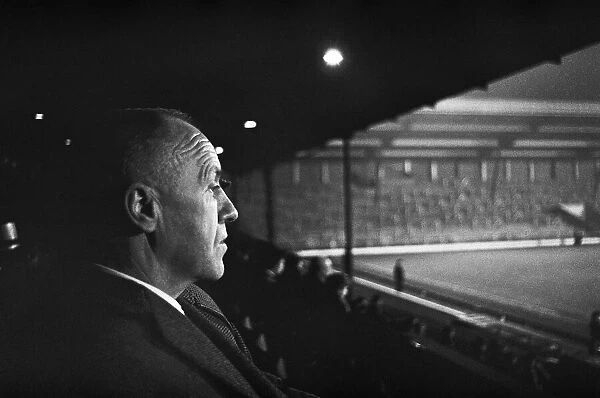 Liverpool Manager Bill Shankly watching a reserve game at Anfield between Liverpool