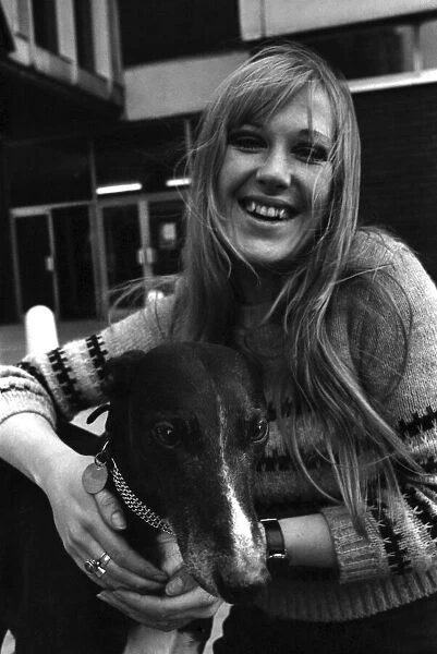 People with animals. Woman. Fiena Ward with her dog Barnabas outside Manchester College