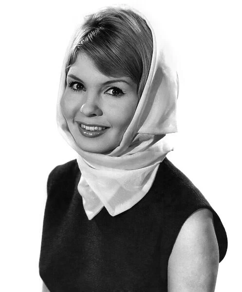 Reveille fashions 1962: Elizabeth Duke seen here modelling head scarf