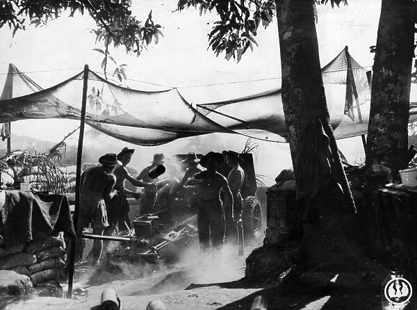 Royal Artillery battery fire against the Japanese in Pinwe. Circa January 1945