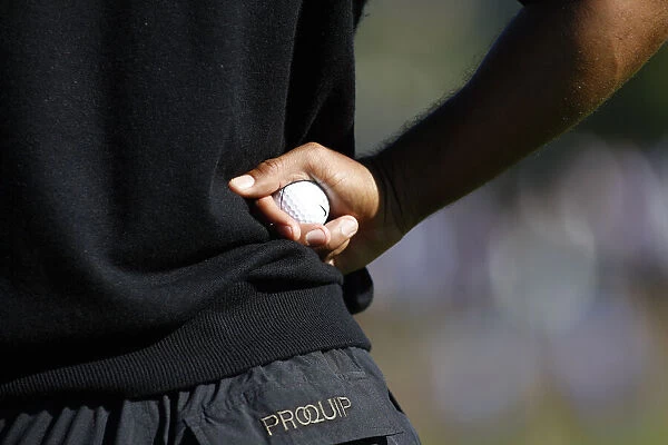 Tiger Woods Holds Golf Ball