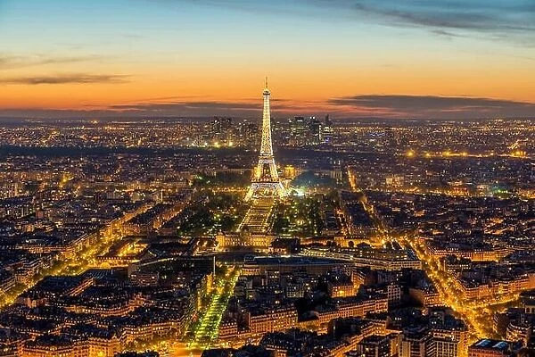 Beautiful view Eiffel tower during light show at dusk, Paris, France