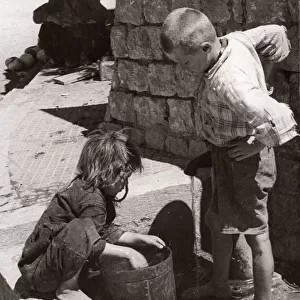 1843 - Syria - children getting water from a well