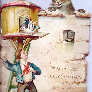 Boy with cat and birds on a cutout Christmas card