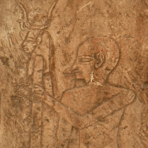 Egyptian Art. Relief depicting a priest carrying the image o