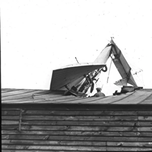 Hubert Lathams Antoinette monoplane crashed on a roof