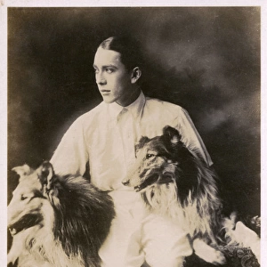 Jack Pickford, film actor, with dogs