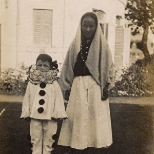 Little boy dressed as a clown - and his nurse