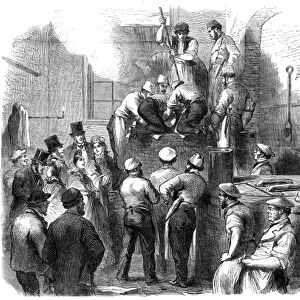 Preparing a giant plum pudding at Marylebone Workhouse, Lond