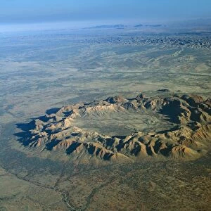 Australia A meteorite crater 130 million years old. Inner crater is 4km wide ramparts are 250 metres high. Rising above Missionary Plain Gosse Bluff, Northern Territory