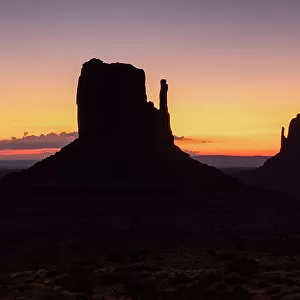 Beautiful light envelops Monument Valley during a summer sunrise, Arizona, United States of America, North America