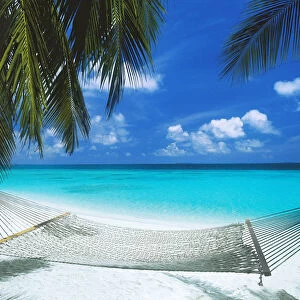 Desert island and hammock on the beach, Maldives, Indian Ocean, Asia