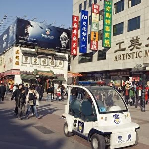 Mini sized police patrol car at Wangfujing shopping street, Beijing, China, Asia