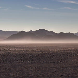 Misty sunrise in the rocky desert, Namibia, Africa