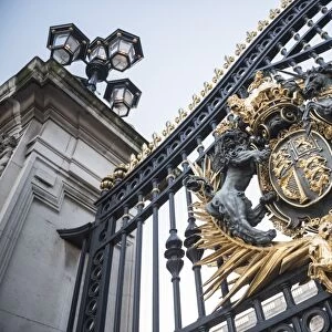 Royal Coat of Arms on the gates at Buckingham Palace, London, England, United Kingdom