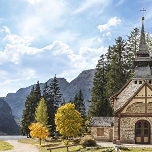 Small chapel on Lake Braies in autumn, South Tyrol, Italy