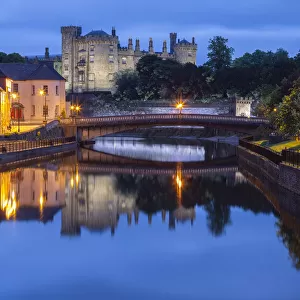 View of the Kilkenny castle reflected in the Nore river. County Kilkenny, Ireland