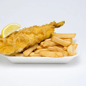Food, Cooked, Fish, A portion of battered deep fried cod with a slice of lemon