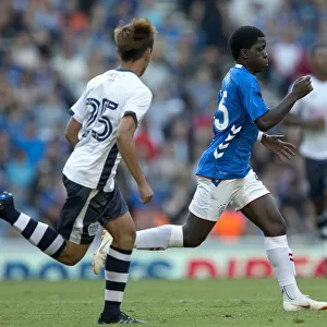 Rangers FC vs Bury: Serge Atakayi Shines in Pre-Season Friendly at Ibrox Stadium - Scottish Cup Champion's Return