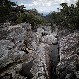 A trail is seen near the Abyss Waterfall at Chapada dos Veadeiros National Park in Alto