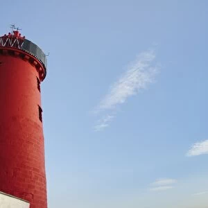 Lighthouse on sea wall protecting harbour entrance, Poolbeg Lighthouse, Great South Wall, Dublin Port, Dublin Bay