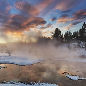 Brilliant sunrise clouds over Grassy Spring at Mammoth Hot Springs in Yellowstone National Park