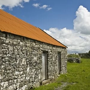 Ireland, the Burren. Traditional stone barn in the countryside