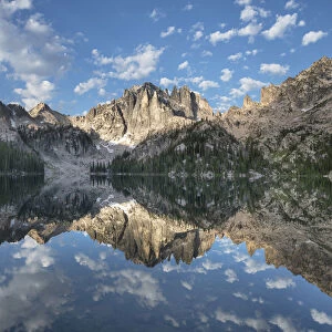 Monte Verita Peak mirrored in still waters of Baron Lake, Sawtooth Mountains Wilderness, Idaho