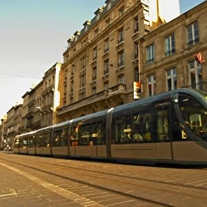 The new modern tram on the posh shopping street Cours de l Intendence in Bordeaux