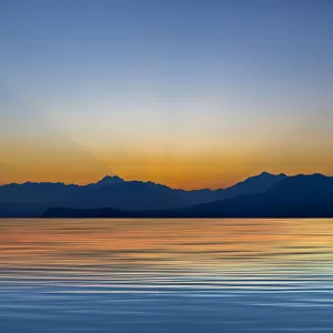 USA, Washington State, Seabeck. Panoramic of sunset on Hood Canal and Olympic Mountains