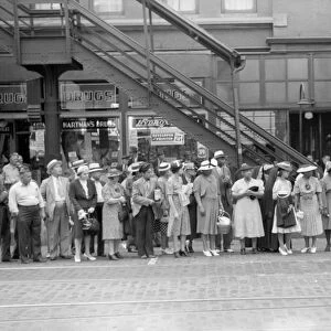 CHICAGO: COMMUTERS, 1940. Commuters waiting for a street car in Chicago, Illinois