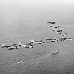 A flying wedge of U. S. Douglas Dauntless dive bombers in the Battle of Midway, June 1942, in which the airplanes sank four Japanese carriers