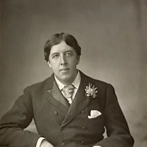 OSCAR WILDE (1854-1900). Irish poet and writer. Photographed by W. & D. Downey, 1889