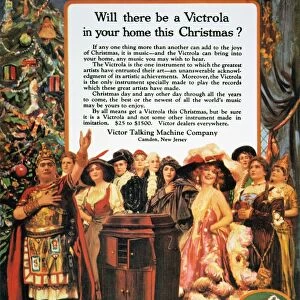 VICTROLA ADVERTISEMENT featuring Enrico Caruso as Rhadames in Verdis Aida (extreme left) and Nellie Melba (second from right), from an American magazine of 1920