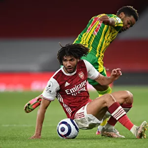 Arsenal's Elneny Wins the Ball in Empty Emirates Stadium: Arsenal vs. West Bromwich Albion (May 2021, Premier League)